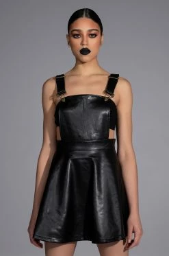 KIARA FAUX LEATHER PINAFORE MINI DRESS 10 KIARA FAUX LEATHER PINAFORE MINI DRESS -AKIRA Sales Shop kiara faux leather pinafore mini dress black 1 1