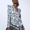 PASSPORT TO EVERYWHERE WRAP FRONT MINI DRESS -AKIRA Sales Shop passport to everywhere wrap front mini dress white black 1 1